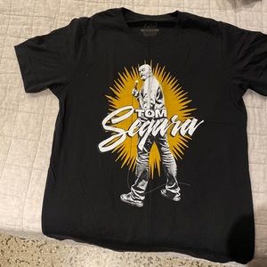 Black tee by Stand Up Comedian Tom Segura from one of his shows